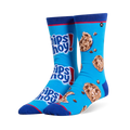 Mismatched bright blue crew socks. One has stacked Chips Ahoy! logos, the other has chocolate chip cookies and loose chips.