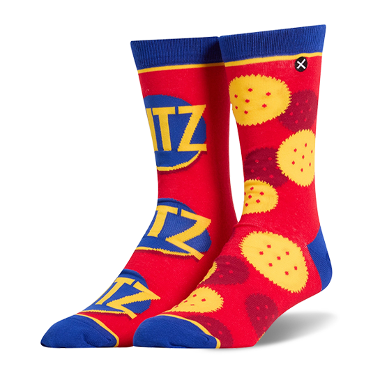 Mismatched red crew socks. Left side has stacked Ritz logos. Right side shows yellow Ritz crackers. Blue cuffs and toes.