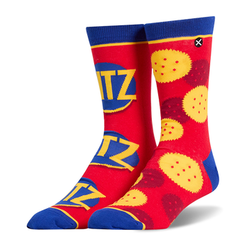 Mismatched red crew socks. Left side has stacked Ritz logos. Right side shows yellow Ritz crackers. Blue cuffs and toes.