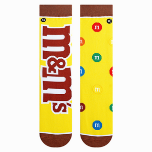 Pair of M&Ms Split socks displayed on a white background; showcasing the full design, including the M&Ms logo and candies.