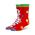 Pair of crew socks, predominantly red, featuring a Skittles design with the Skittles logo and multicolored candies printed on them.