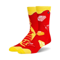 Pair of crew socks in red and yellow, featuring a Starburst candy design.  The socks show the candy's logo and individual candies.