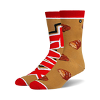Pair of crew socks in tan and red. One sock features the Twix logo, the other has scattered Twix bar images.