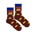 Flat lay of two brown socks showing the Snickers logo, a candy bar cross-section, and scattered peanut halves.