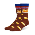 Brown crew socks featuring a blue cuff, the Snickers logo, a candy bar cross-section, and a scattered peanut pattern.