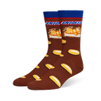 Brown crew socks featuring a blue cuff, the Snickers logo, a candy bar cross-section, and a scattered peanut pattern.