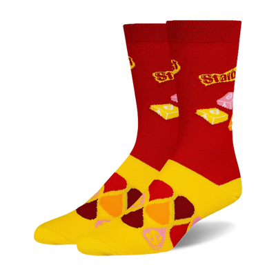 Red crew socks with yellow feet, featuring Starburst logos, wrapped candies, colorful drops, and small S letters.