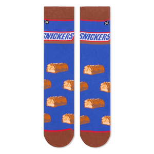 Flat lay of two blue crew socks side-by-side, displaying the Snickers logo at the top and mini chocolate bars below.