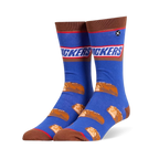 Blue crew socks featuring the Snickers logo at the calf, brown accents, and a pattern of sliced mini chocolate candy bars.