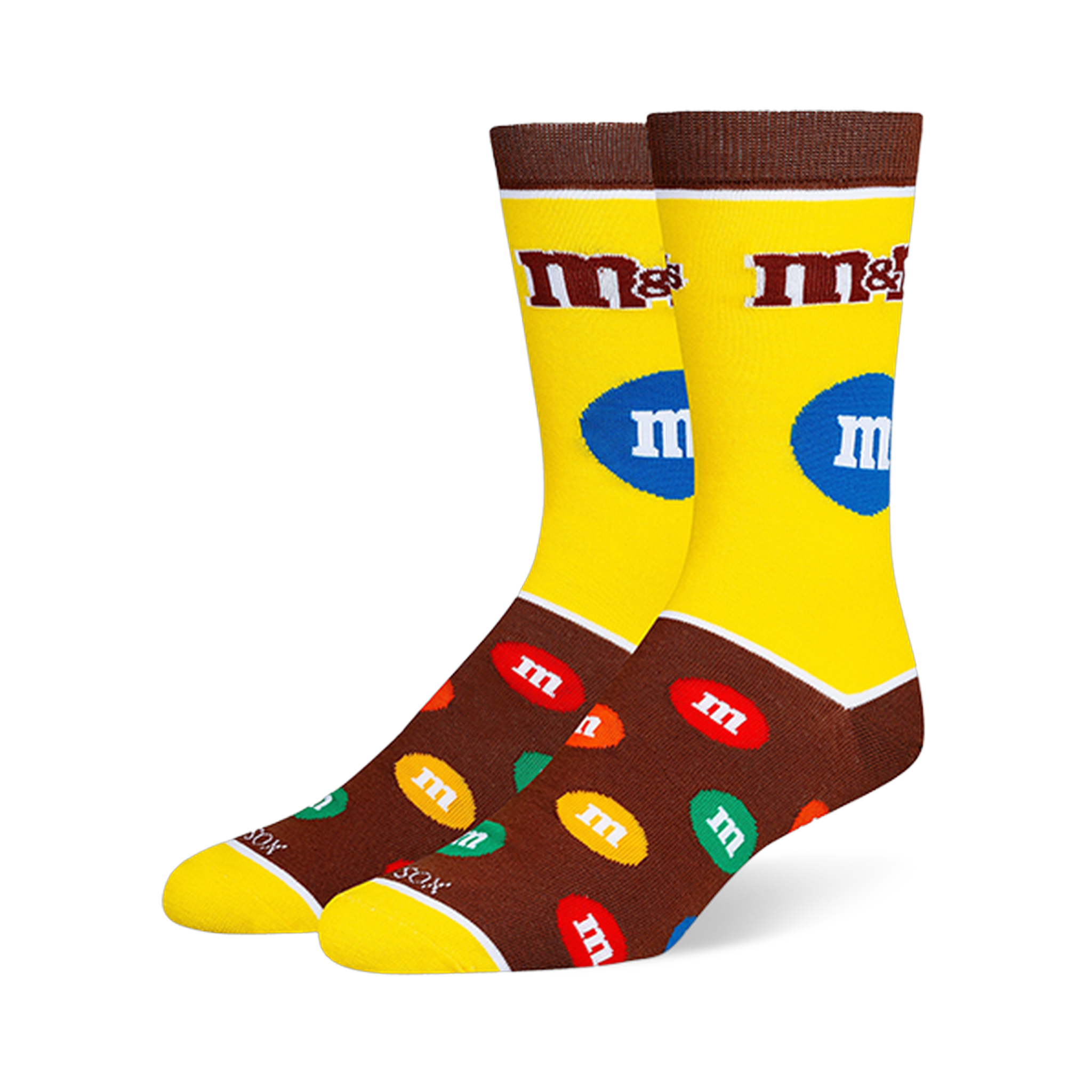 Yellow and brown M&M's crew socks with the classic logo on the leg and a pattern of colorful candy pieces on the dark foot.