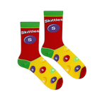 Flat lay of Skittles socks showing a red upper with a large purple candy, green cuffs, and a yellow foot with colorful drops.