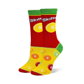 Crew socks with a red upper featuring the Skittles logo, green cuffs and heels, and a yellow foot with scattered candy pieces.