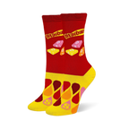 Red crew socks with the Starburst logo and wrapped candies, featuring a yellow foot covered in colorful droplet shapes.