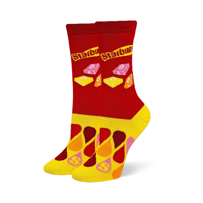 Red crew socks with the Starburst logo and wrapped candies, featuring a yellow foot covered in colorful droplet shapes.