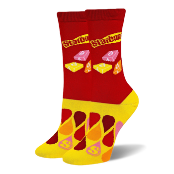 Red crew socks with the Starburst logo and wrapped candies, featuring a yellow foot covered in colorful droplet shapes.
