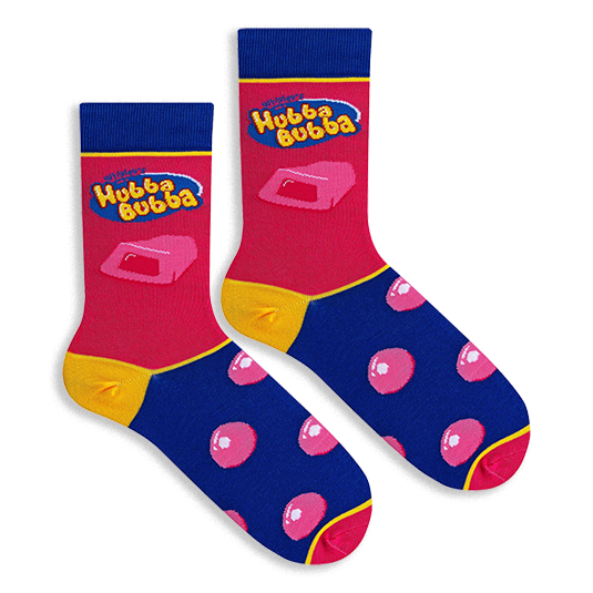 Flat lay of two Hubba Bubba socks showing the pink leg with logo, yellow heel, and blue foot covered in pink bubbles.