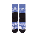 Flat lay back view of the socks showing a solid black middle band and blue top and bottom bands with white cloud patterns.