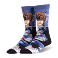 Crew socks featuring stacked graphic panels of Death Note characters Light and Ryuk, with L placed down near the black toes.