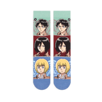 Flat lay of two crew socks side by side showing horizontal color blocks featuring determined anime character faces.