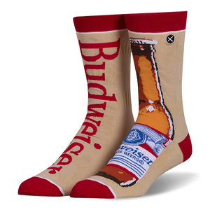 Mismatched tan crew socks with red accents. Left sock has red Budweiser text, right sock shows a brown beer bottle.