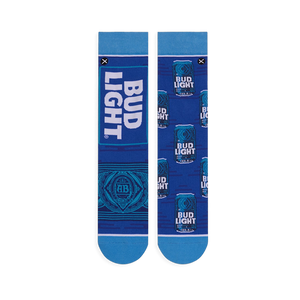 Flat lay of mismatched royal blue socks. Left shows a large vertical Bud Light logo, right has a pattern of blue beer cans.