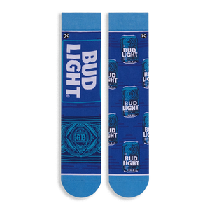 Flat lay of mismatched royal blue socks. Left shows a large vertical Bud Light logo, right has a pattern of blue beer cans.