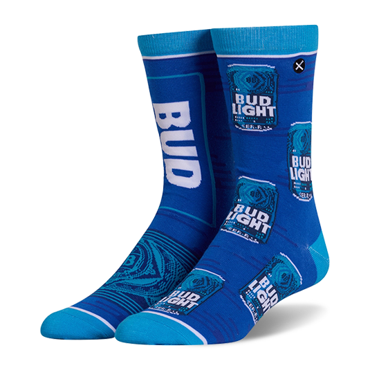 Royal blue crew socks with a split design. One features a giant white Bud Light logo, the other shows repeating beer cans.