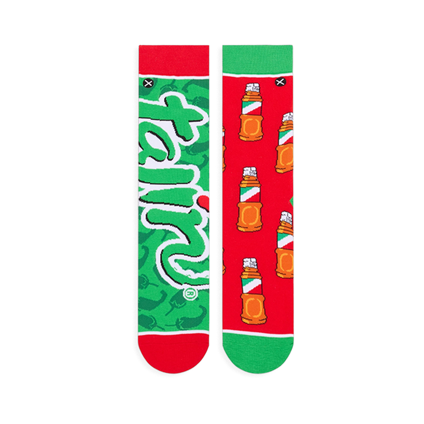 Flat lay of the mismatched socks. The green sock shows the full Tajin logo, and the red sock shows the full bottle pattern.