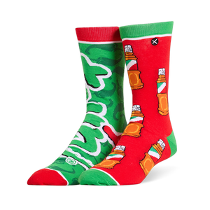 Mismatched Tajin socks. One is green with a huge logo, and the other is red covered in a pattern of seasoning bottles.