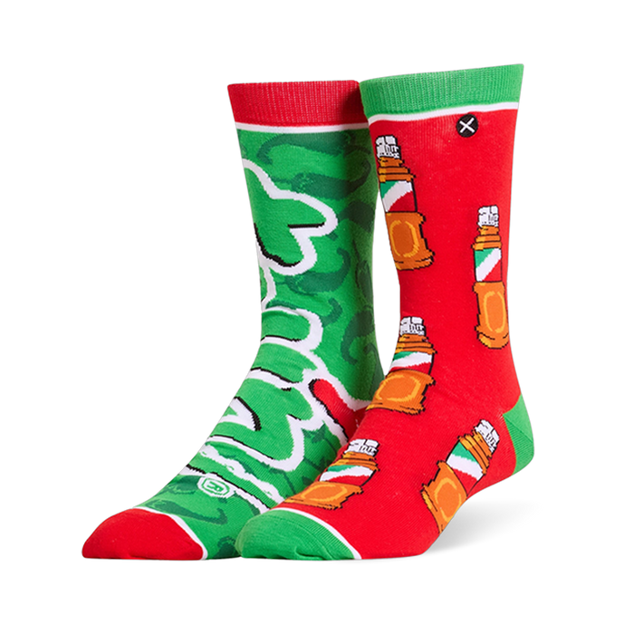 Mismatched Tajin socks. One is green with a huge logo, and the other is red covered in a pattern of seasoning bottles.