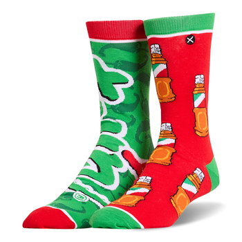Mismatched Tajin socks. One is green with a huge logo, and the other is red covered in a pattern of seasoning bottles.