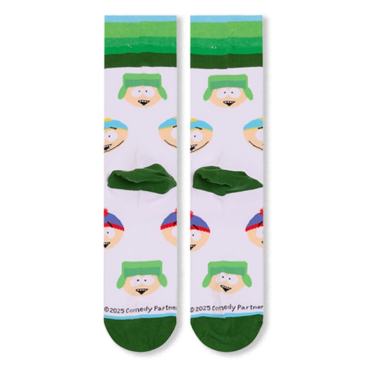 Flat lay back view of white South Park socks showing the character pattern, green heels, and green toes.