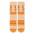 Flat lay front view of beige crew socks showing the repeated Kenny graphic, bold text, orange stripes, and orange toes.