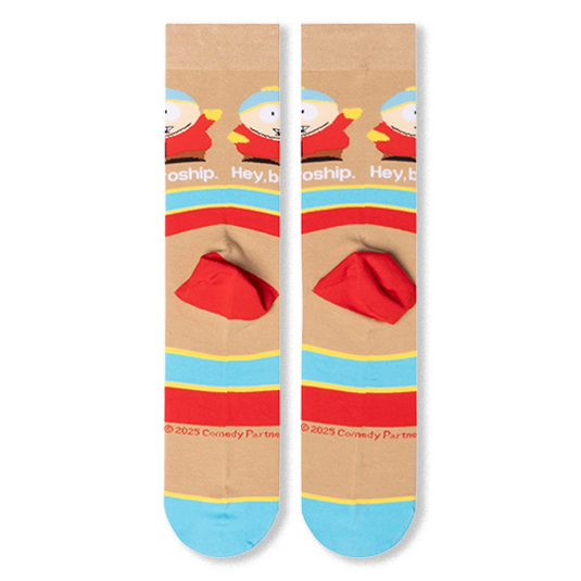 Back view of tan socks laid flat showing solid red heels, horizontal stripes, Cartman pattern, and red copyright text.
