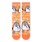 Front flat lay of orange socks showing a repeating pattern of a sleepy penguin, coffee cups, flowers, and white text.