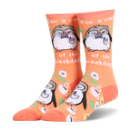 Orange crew socks showing a tired penguin in glasses, coffee cups, flowers, and the text Got a case of the weekdays.