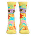 Front view of yellow crew socks showing the purple Gushers logo band on the shins and colorful neon splatters throughout.
