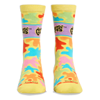 Front view of yellow crew socks showing the purple Gushers logo band on the shins and colorful neon splatters throughout.