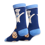 Angled view of dark blue socks highlighting the light blue heel and back of the Pillsbury Doughboy and cinnamon roll design.