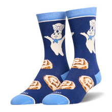 Dark blue crew socks featuring the Pillsbury Doughboy on the leg, cinnamon rolls on the foot, and light blue accents.