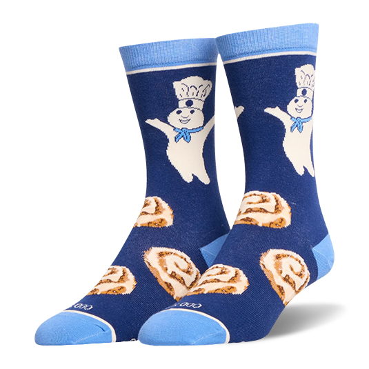 Dark blue crew socks featuring the Pillsbury Doughboy on the leg, cinnamon rolls on the foot, and light blue accents.