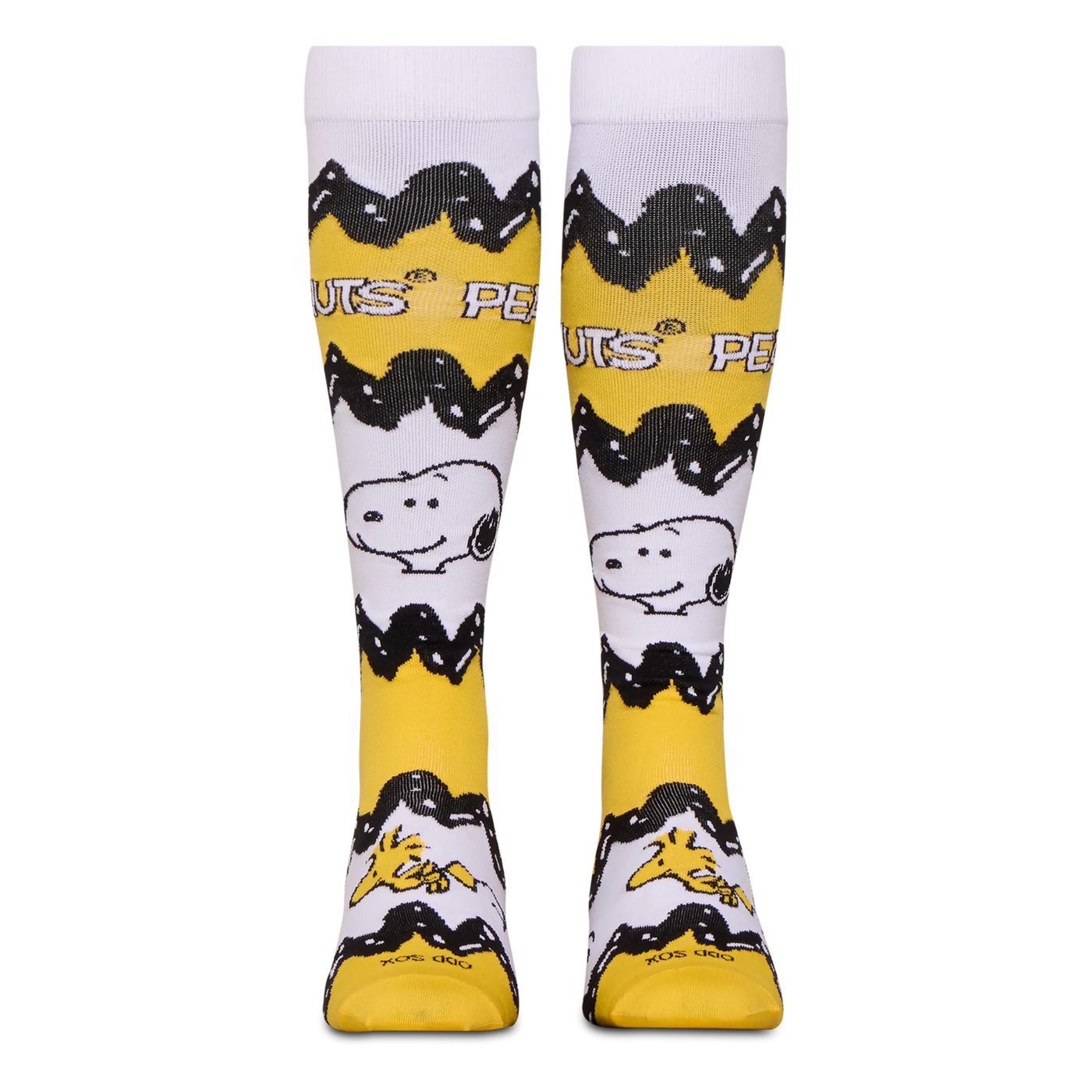 Front view of tall yellow and white Peanuts socks showing the black zigzag stripe, Snoopy, Woodstock, and Peanuts text.