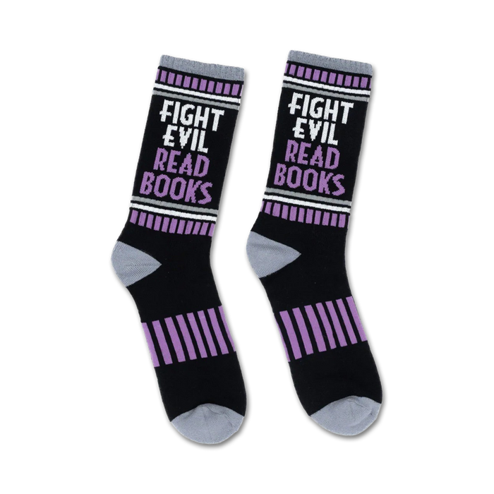 black crew socks with gray toe, heel, and top. white repeating pattern of purple stripes and the words 