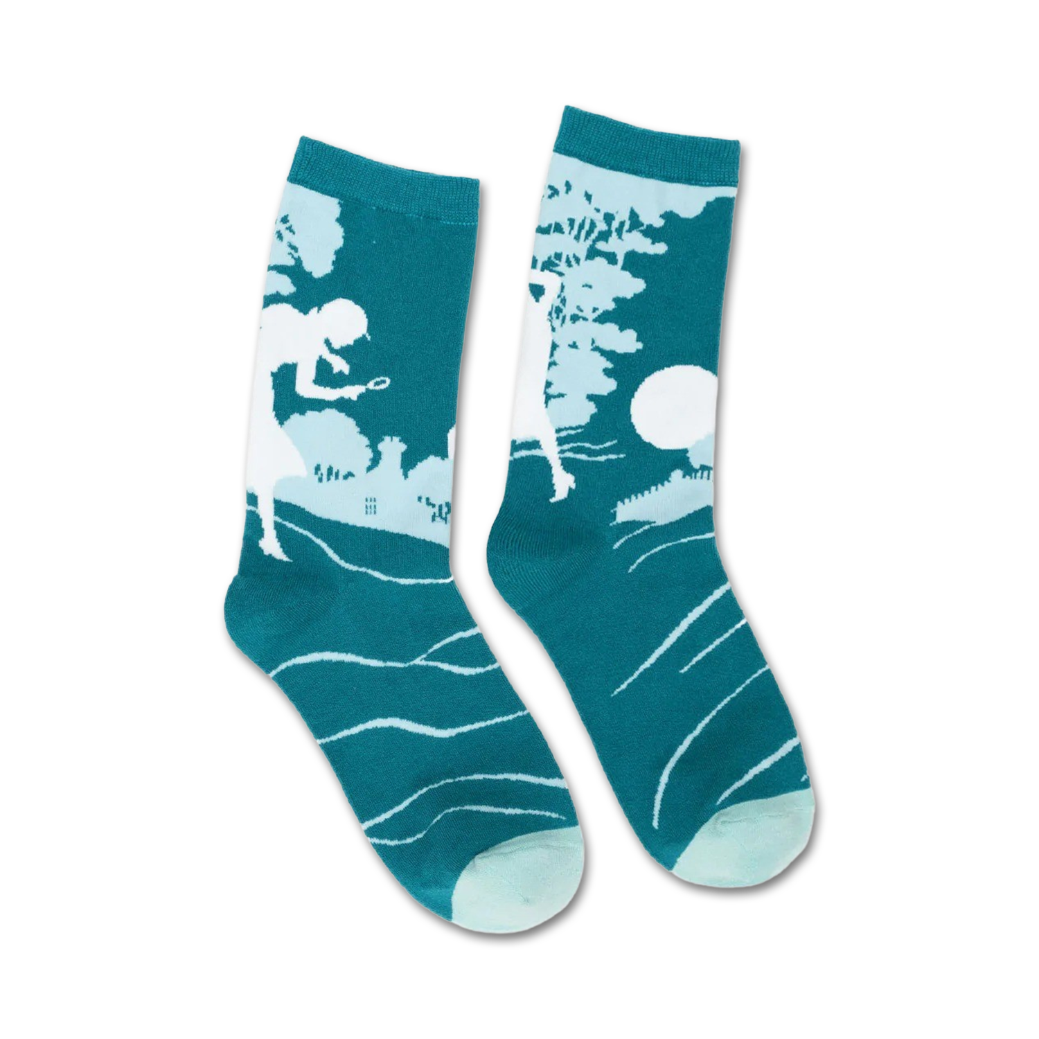 A pair of teal crew socks with a white silhouette of Nancy Drew solving a mystery.  Subtle wave pattern at the bottom.