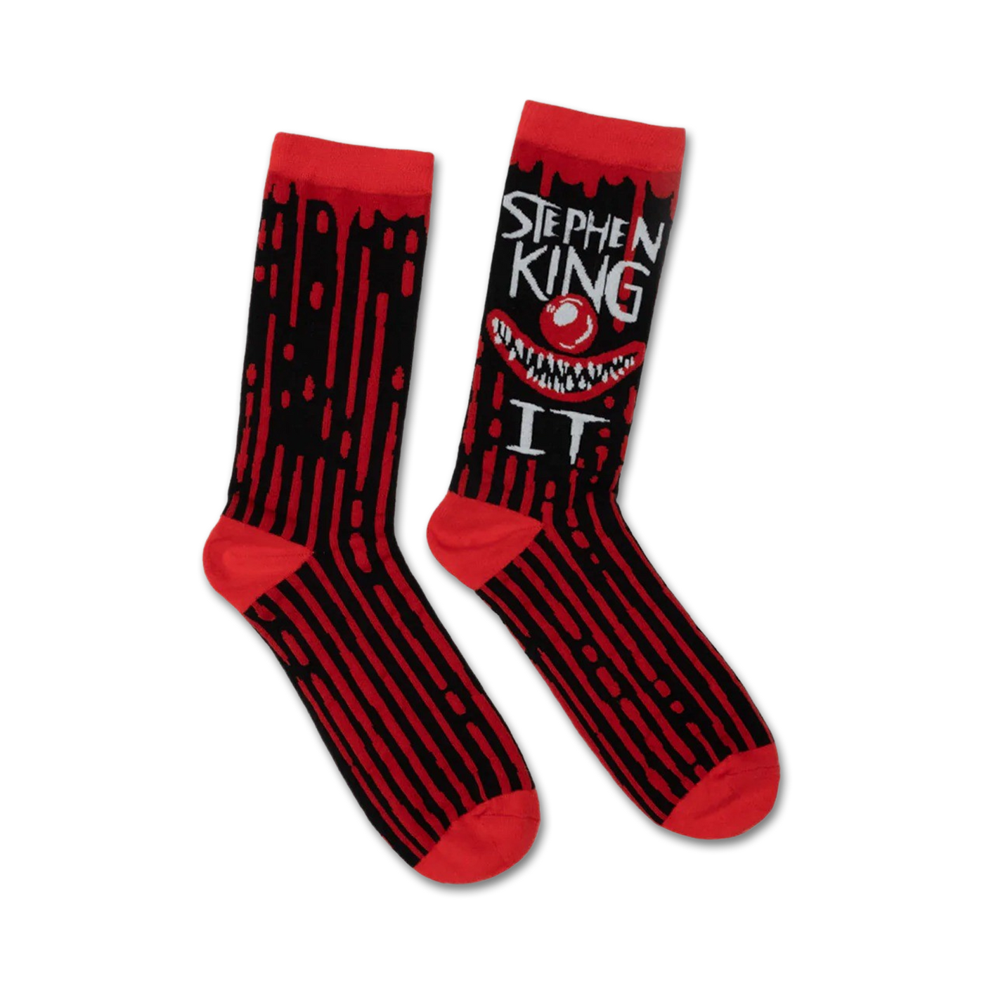 Pair of black and red crew socks.  A grinning Pennywise clown face and 'Stephen King IT' text are featured on one side. Dripping blood design accents the stripes.