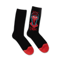 Pair of black crew socks.  Feature a red and teal graphic of a bloody bucket from Stephen King's Carrie, with the title below.