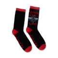 Pair of black crew socks with red cuffs. Features a graphic design of a fly, dripping text that says 'Stephen King The Shining', and 'Redrum' on the sole.