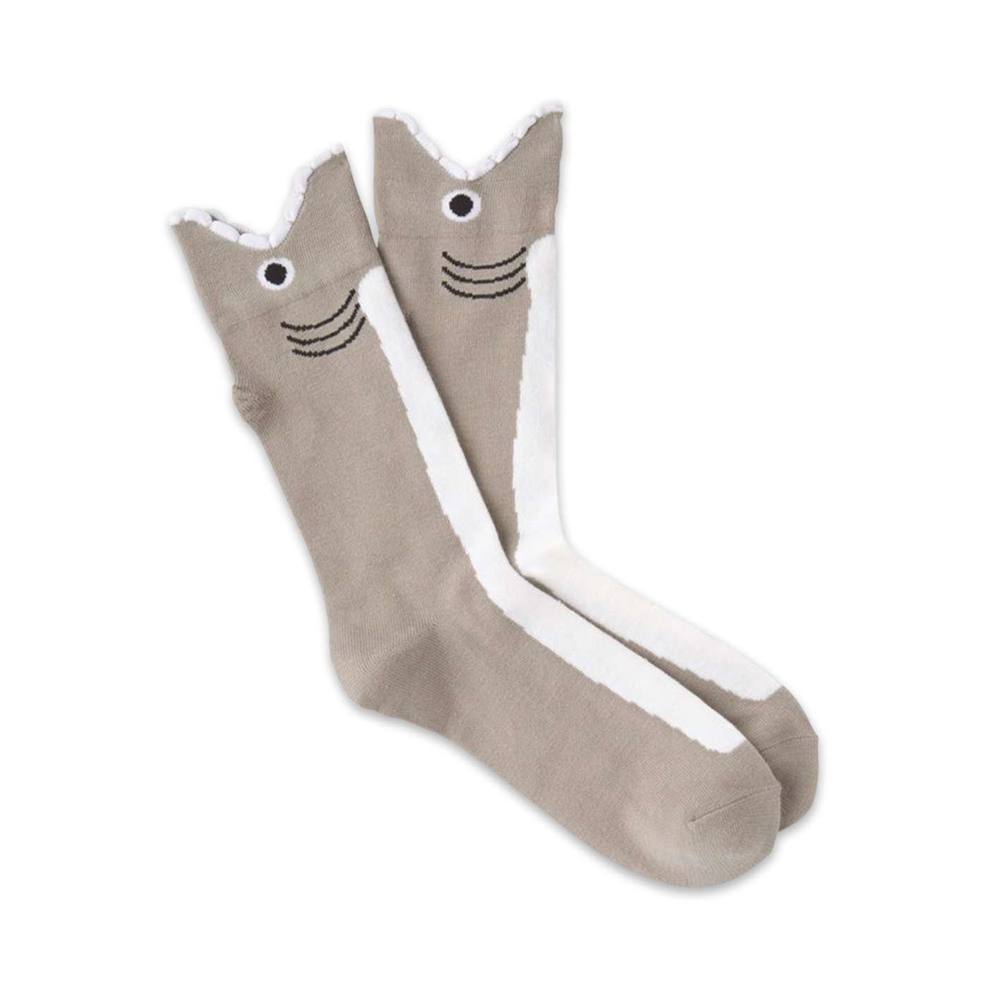Pair of taupe crew socks with a whimsical white and black shark face design on the leg. 