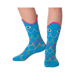 Lifestyle photo showing Fish Wide Mouth socks on a person's legs against a black background.
