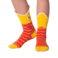 Lifestyle shot of Piranha Wide Mouth socks on a person's legs against a black background.